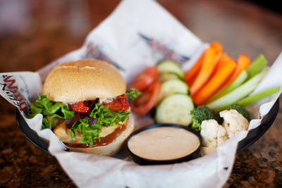 Wing Nutz sandwich with carrots and celery